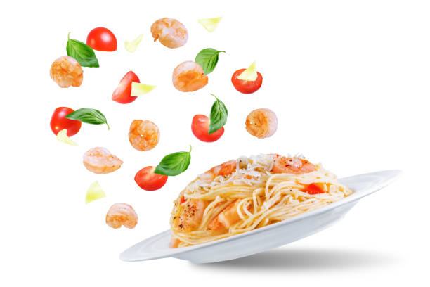 istock Shrimp pasta with tomatoes and cheese on a white isolated background 1249111656