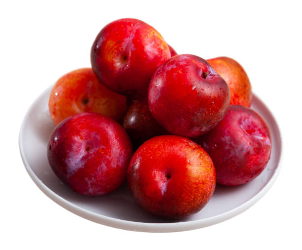 istock Fresh red plums in plate 1249111751