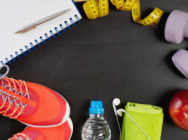 istock Fitness equipment on blackboard 1249114536