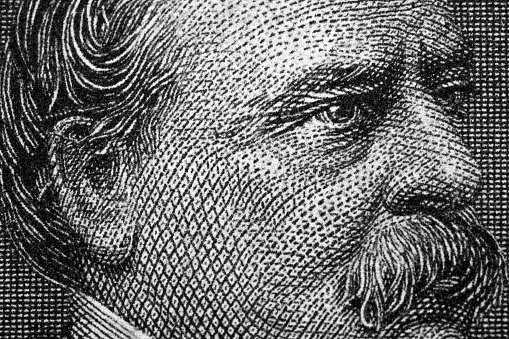 Grover Cleveland a close-up portrait from old American Dollars