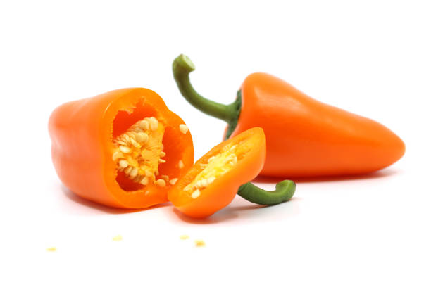 Heap of hot red, orange and green Chili peppers for spicy food.