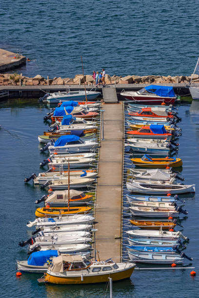 istock Marina with boats at a jetty 1249116585