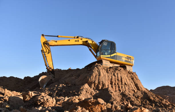 istock Large excavator working at construction site. Backhoe during earthworks on sand quarry 1249116680