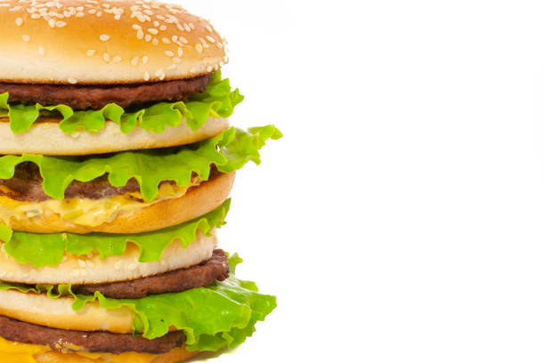 istock Very big double cheeseburger isoated on white background 1249117757