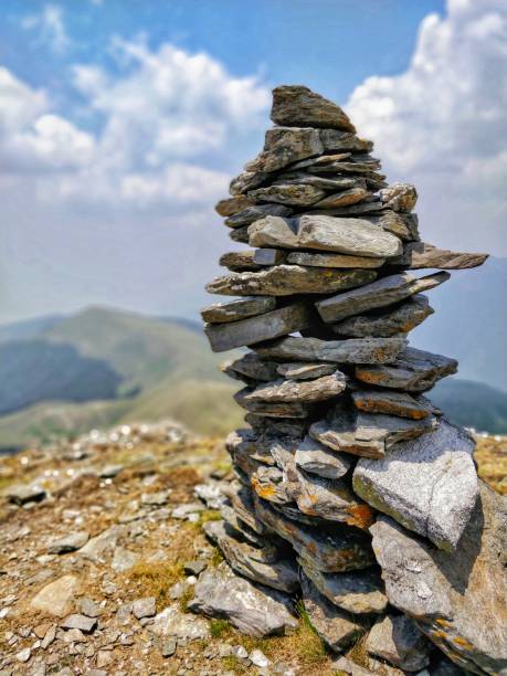 istock Beautiful stone stack with blur background on top of a Himalayan Peak 1249121631