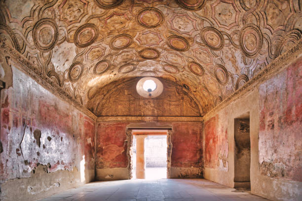 Looking into the hot baths at the famous Stabian baths, which date back to the 2nd century BC, are among the oldest we know of the Roman world at the ruins of Pompeii. The basins were hoisted and filled with hot or cold water. So you could climb from the sauna into cold water and back. The hot baths are considered the masterpiece of architecture at the time. Pompeii is an ancient Roman city that was buried under 4 to 6 m (13 to 20 ft) of volcanic ash and pumice in the eruption of Mount Vesuvius in AD 79. Today Pompeii is a UNESCO World Heritage Site and is one of the most popular tourist attractions in Italy.