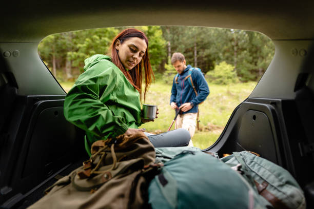 istock Adventurous couple taking a break from their road trip 1249126175