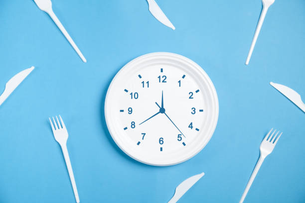 istock Clock in the plate. Time to eat 1249141519