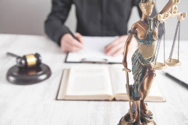 istock Statue of Lady Justice. Judge working in office 1249141525