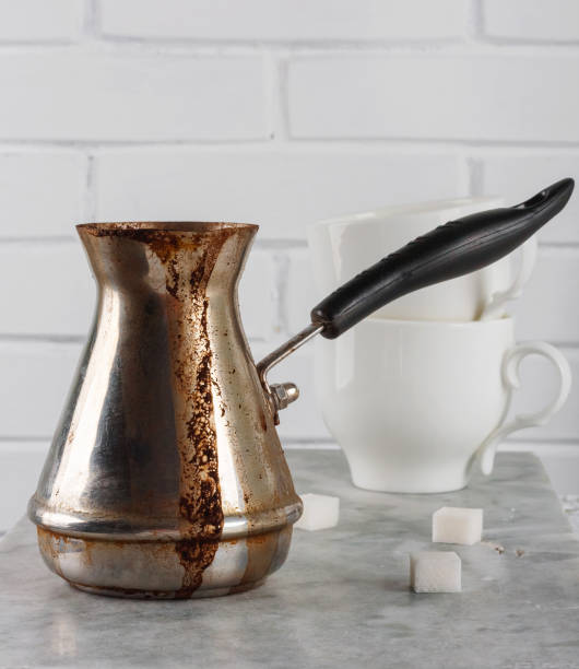 istock Turkish Cooper with freshly brewed coffee on  marble table 1249144086