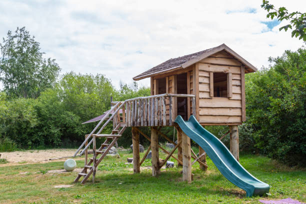 istock Wooden playhouse in a park 1249146092