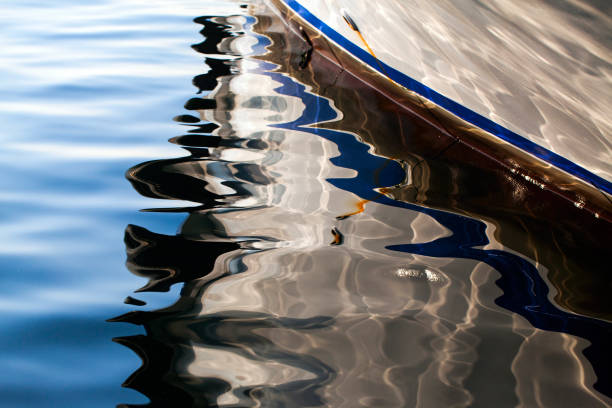 istock Boat Reflection on the Sea Water 1249146299