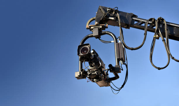 telescopic crane with tv camera - filmando com guindaste imagens e fotografias de stock