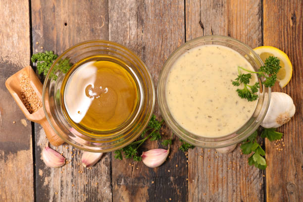 istock salad sauce with mustard, oil, garlic 1249150712