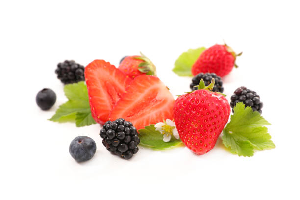 Colorful berries assortment on rustic wooden table