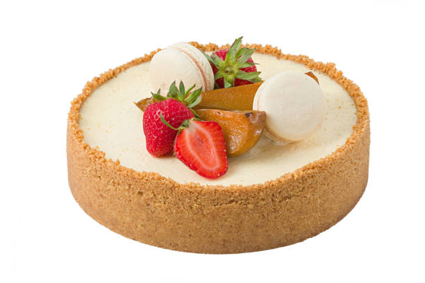 istock Cheesecake with strawberries, caramelized pear and macaroons 1249156421