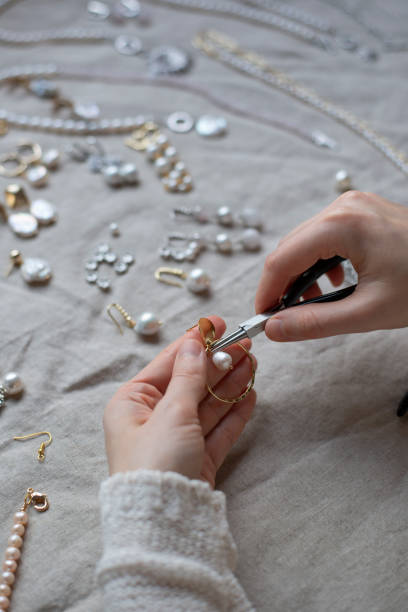 istock Jewelry designer working in studio with jewelry tools 1249156955