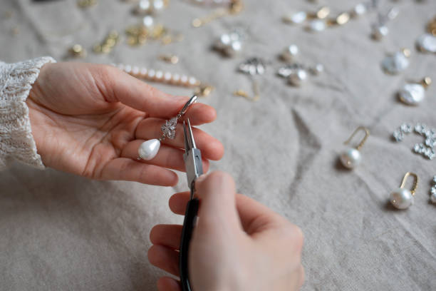 istock Jewelry designer working in studio with jewelry tools 1249156968