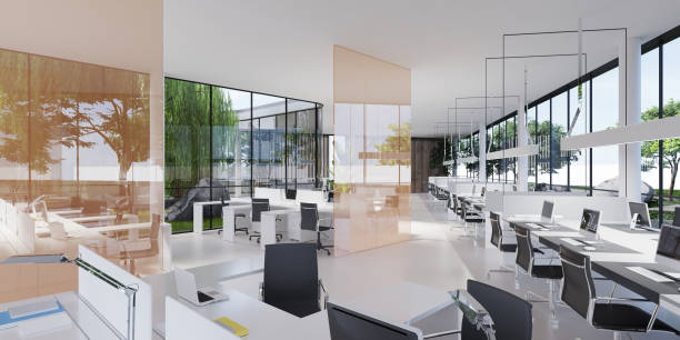 istock Spacious light and lighted office with work desks and glass partitions between. 1249162255