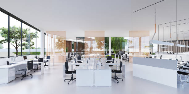 istock Spacious light and lighted office with work desks and glass partitions between. 1249162572