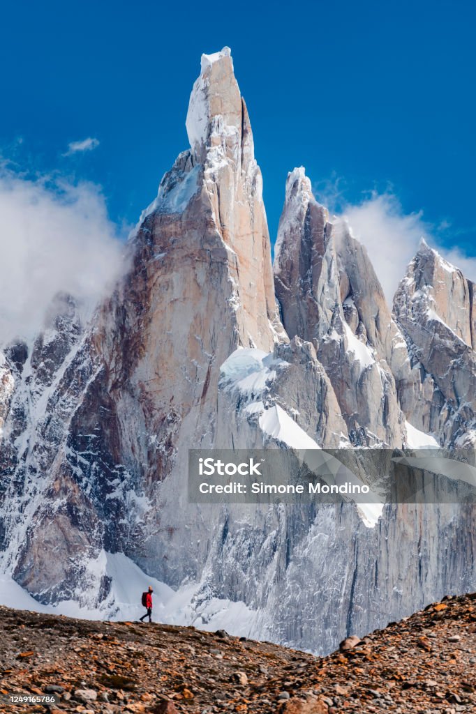 Cerro Torre and excurionist How small we are towards the mountains Cerro Torre Stock Photo