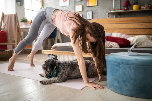 istock Trying to do downward facing dog position 1249167720