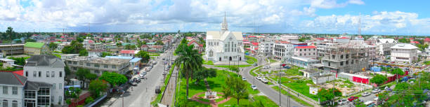 Georgetown Guyana Panorama General Panorama of Georgetown with the St George's Cathedral centered. The Cathedral is the world's tallest freestanding wooden structure. Photo taken in 2007. guyana photos stock pictures, royalty-free photos & images