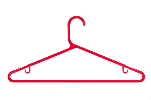 Red plastic coat hanger isolated on a white background