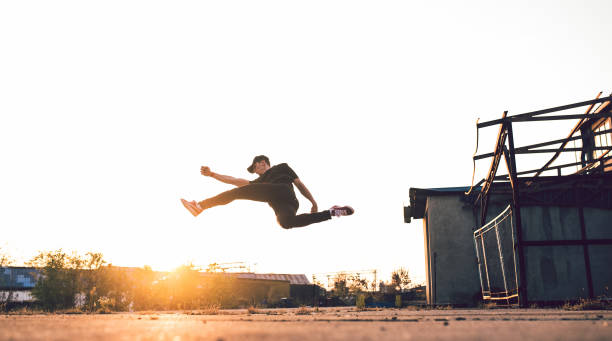 istock Athletic man showing acrobatic skills 1249194858