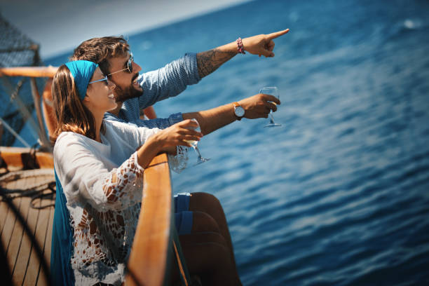 istock Young couple on a sailing cruise. 1249195032