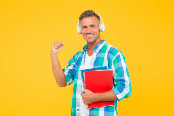 istock Best online learning platforms to explore. Man listening online lecture. Online courses for remote learning during quarantine. Adult student listen music. Guy wear headphones. Infinity learning 1249198166