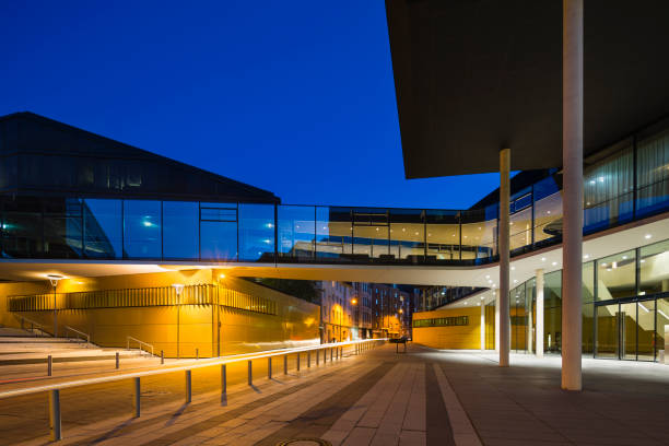 istock Modern Glass Bridge In Aachen, Germany At Night 1249198421
