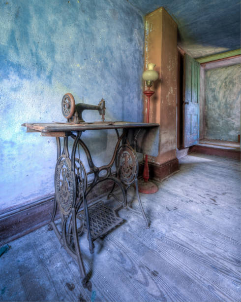 istock Sewing room in an old abandoned rural house 1249199731