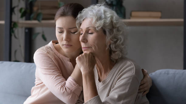 istock Supportive grownup daughter comfort upset elderly mom 1249199851