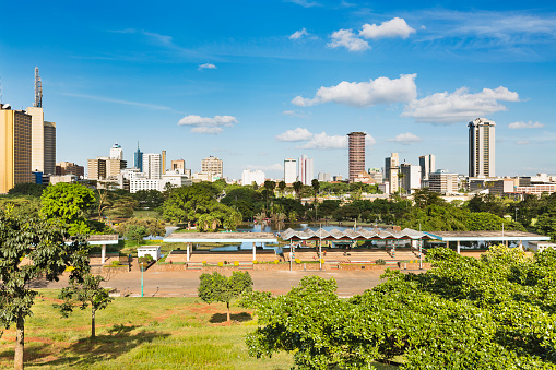 View of the skyline of Nairobi, Kenya with Uhuru Park in the foreground.