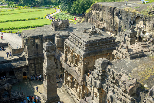 Aurangabad, India - October 28 2019: Birds eye view of an ancient temple carved in rock top downwards at Ellora near Aurangabad India, a UNESCO world heritage site.