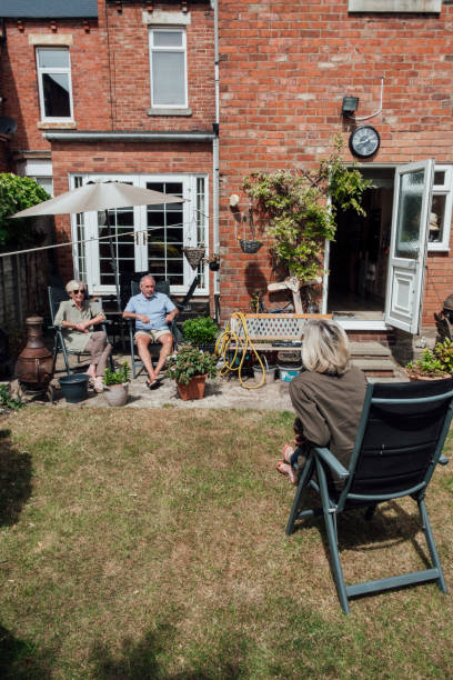 istock Talking to Parents Socially Distanced 1249208144
