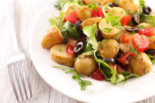 vegetable salad with potato, tomato and olive