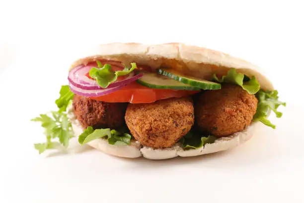 falafel with fresh vegetable in pita bread