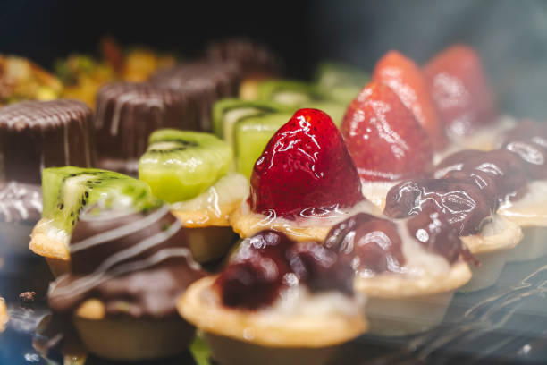 istock Strawberry and kiwi tarts with chocolates 1249213743