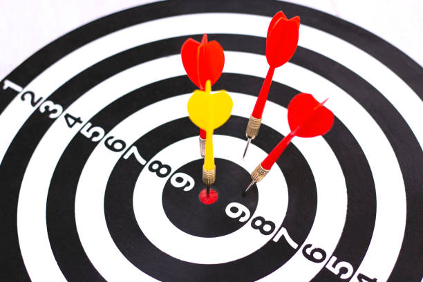 istock Right to Target Concept Using Darts in Bulseye on Darts Business Success Concept. destruction of competition. one arrow in bulseye, three red arrows fell 1249215640