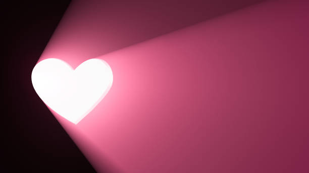 istock Heart shaped hole. Spotlight behind him. Abstract background. 1249217827