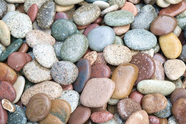 istock abstract background with wet round multi-colored reeble stones 1249219358