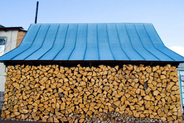 Firewood texture background, abstract and wooden material. For fare place.