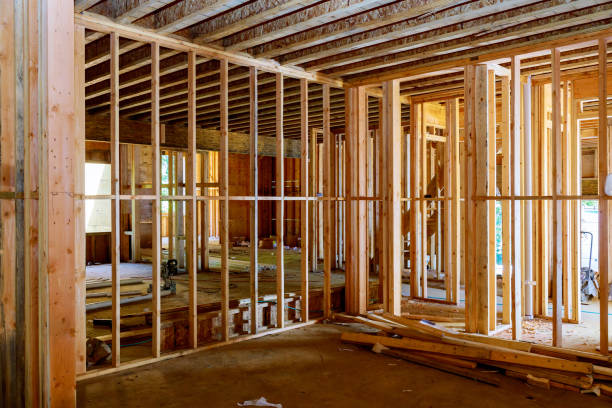 istock New home construction framing of a house 1249222892