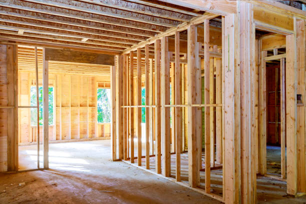 istock Wooden house roof frame structure on a new development 1249222897