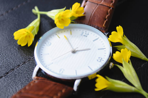 istock Watch with small yellow flowers 1249223205