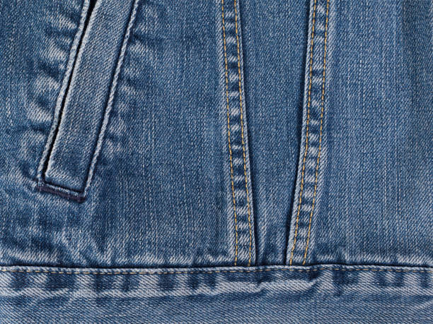 istock Texture of blue jeans background 1249223990