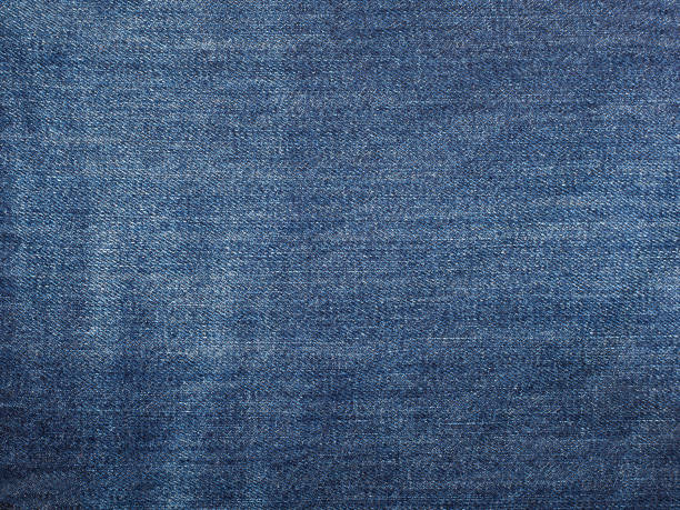 istock Texture of blue jeans background 1249223992