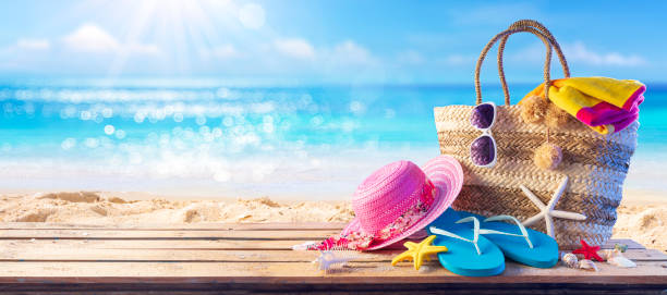 istock Beach Bag On Seashore With Accessories - Summer And Sea 1249224120